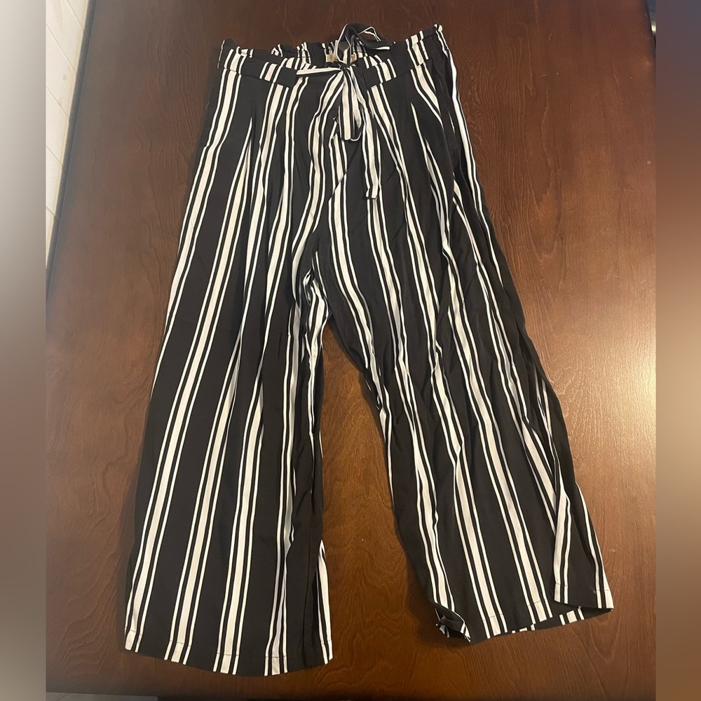 Size large, black with white stripes